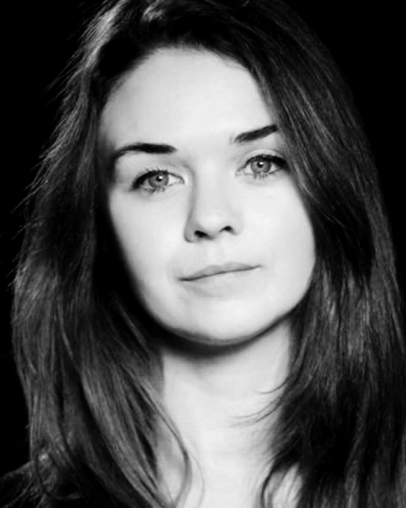 Clare, who offers massage with Roland Fitness, in black and white.